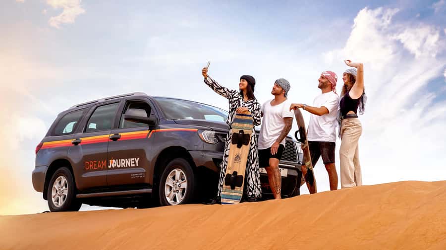 Dubai Desert Safari - Camel Ride, Sandboarding & 30 Min Quad - The 50-minute ride from Dubai to Lahbab