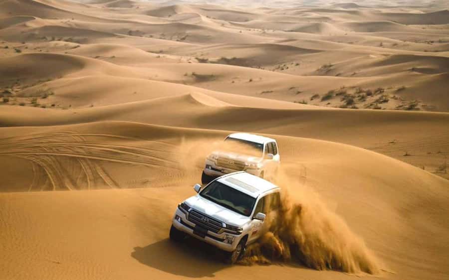 Dubai: Desert Safari, Camel Ride, Sandboarding, Quad Bike - Practical preparation for the sand