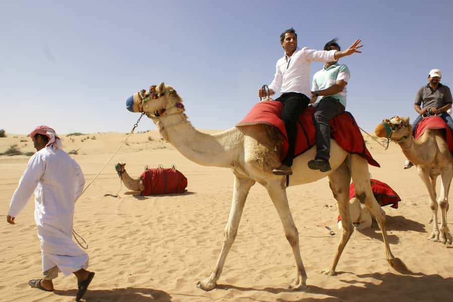 Dubai: Desert Safari, Quad Bike, Camel Ride and Sandboarding - The guides shape the experience