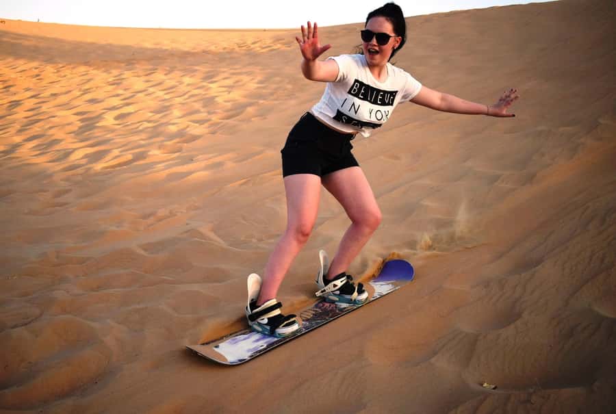 Dubai Desert Safari, Quad Biking, Camel Ride, & Sandboarding - Barbecue Dinner Under the Stars