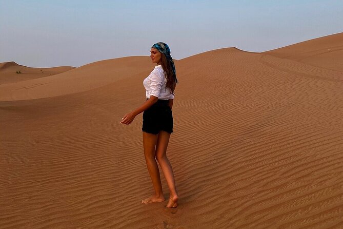 Dubai Desert Safari: Tanoura Show, Dune Bashing and BBQ Dinner - Arabic coffee, dates, and a short camel ride