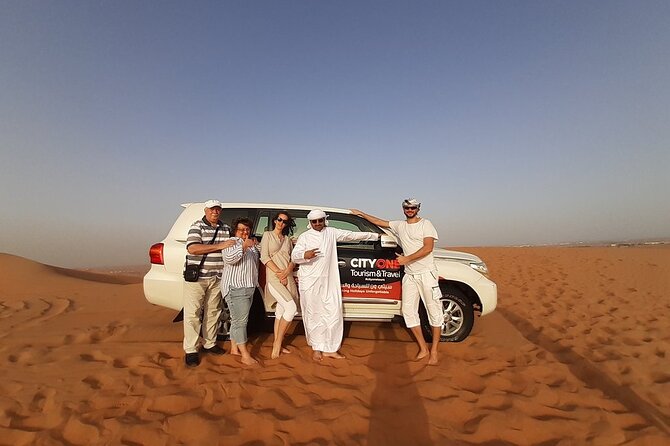 Dubai Desert Safari: Tanoura Show, Dune Bashing and BBQ Dinner - BBQ dinner, sweets, and live shows