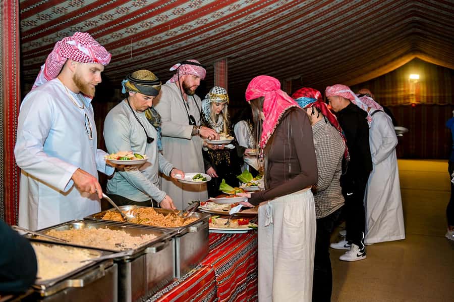 Dubai: Desert Safari with BBQ Dinner & Quad Biking Options - The Al Aweer camp and the seven-hour evening