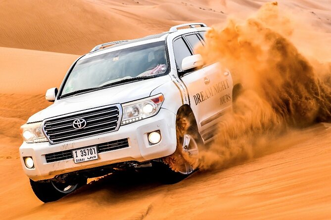 Dubai Desert Safari with Dune Bashing, Camel Ride, & BBQ Dinner - What to know before booking
