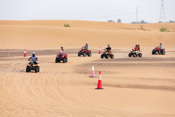 Dubai Desert Safari with Quads, BBQ Dinner, Camel ride, & Shows - Arabic Coffee, Dates, and the Bedouin-Style Camp