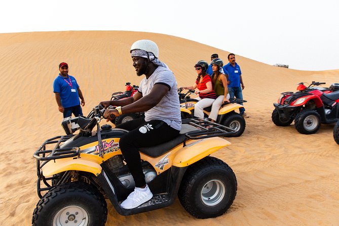 Dubai Desert Safari with Quads, BBQ Dinner, Camel ride, & Shows - Quad Biking and the Camel Ride