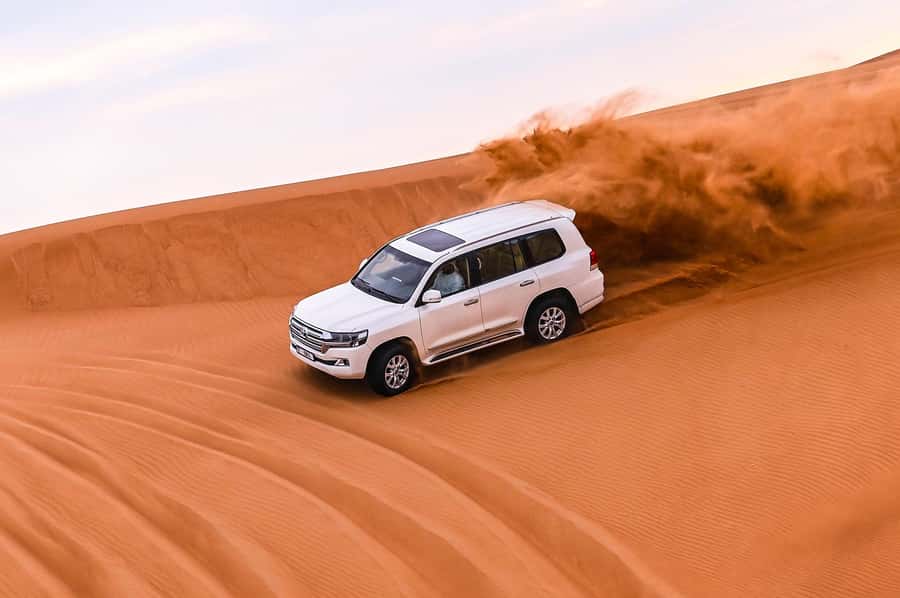 Dubai: Desert Safari with VIP BBQ and Optional Quad Bike - Dune bashing across the red sand