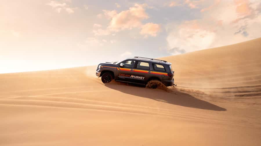 Dubai Desert Trail: Guided Quad/Polaris and Red Dunes Safari - A camel ride measured in minutes