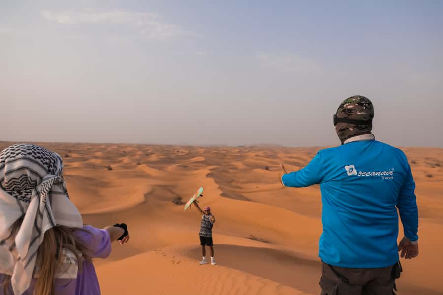 Dubai: Dune Buggy Desert Safari, Camel Ride & Sandboarding - BBQ dinner and live entertainment