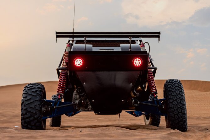 Dubai Dune Buggy Safari Tour in Red Dunes Options - Sandboarding, camel rides, and the camp