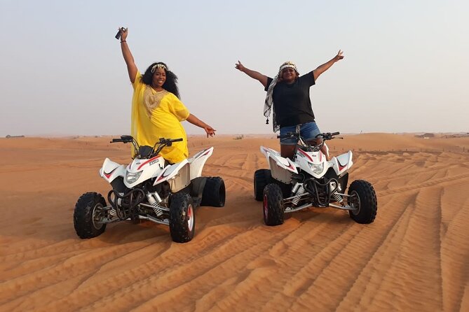 Dubai Dunes Safari With Quad Bike, Camel Ride, BBQ Dinner & Live Shows - Sunset photographs, camels, and sandboarding