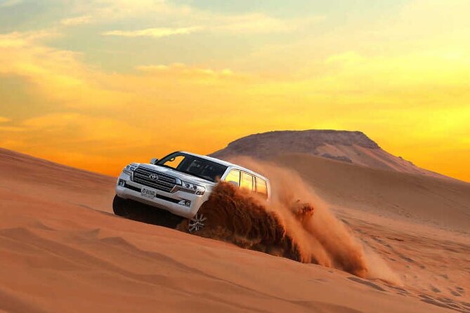 Dubai Dunes Safari With Quad Bike, Camel Ride, BBQ Dinner & Live Shows - Dune bashing across Lahbab