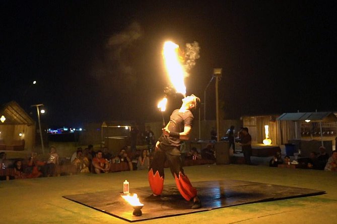 Dubai Evening 4x4 Desert Safari ATV Bike ,Camel Ride , BBQ Dinner - Sandboarding adds a quieter desert moment