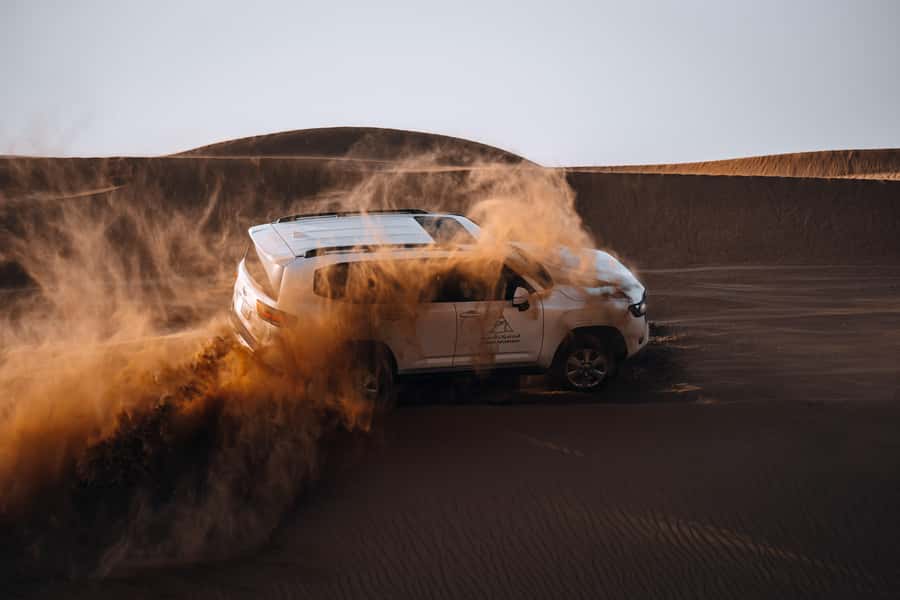 Dubai Fort Lisaili Desert: Quad, Buggy Ride & Free Souvenir - Camel rides, falcons, henna, and archery