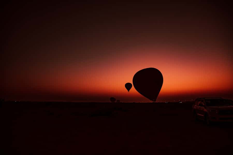 Dubai: Hot Air Balloon, Desert Safari, and Quad Biking Tour - Landing, photos, and the return to camp