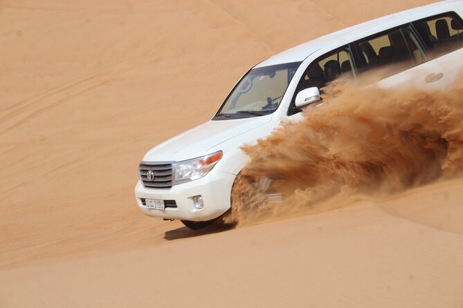 Dubai: Jeep Desert Safari, Camel Ride, and Quad Bike Tour - Guides, service, and the human side of the trip