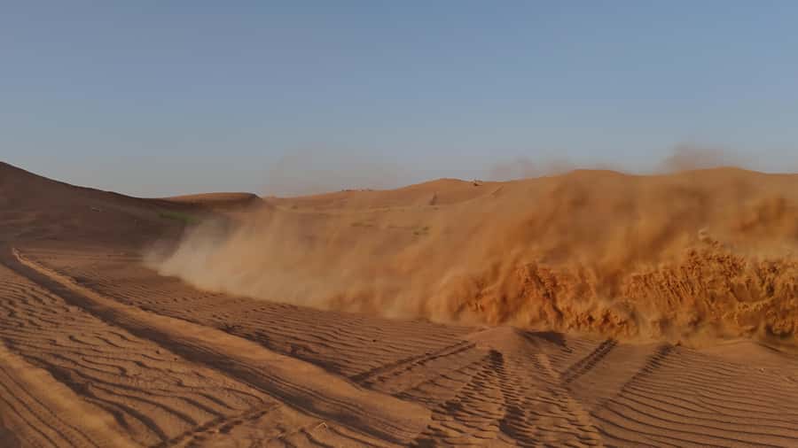 Dubai: Private Dune Buggy, Camel Ride, and Sand Boarding! - Red dunes, rock formations, and the sandboard stop