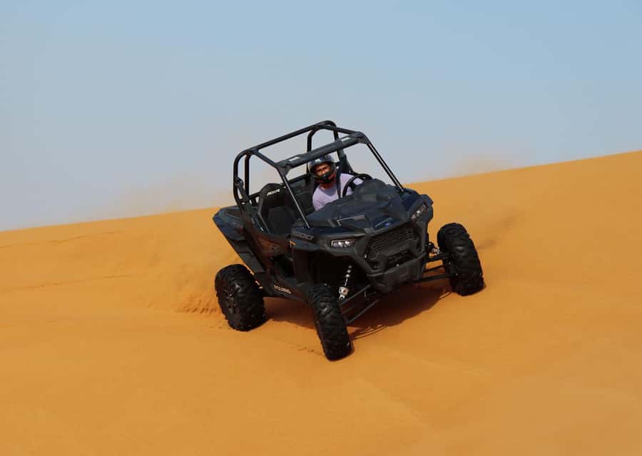 Dubai: Quad Bike, Dune Buggy, and Sandboarding Experience - Photo stops with help from the guides