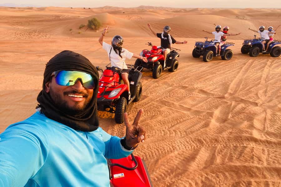 Dubai: Quad Bike Safari, Camels & Al Khayma Camp BBQ Dinner - From Dubai hotels to the Lahbab red dunes