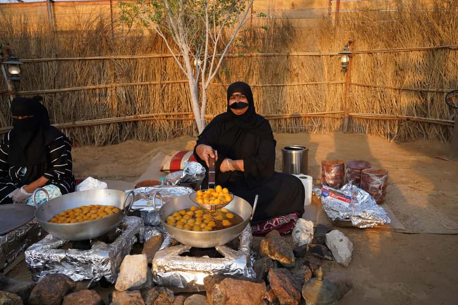 Dubai: Quad Bike Safari, Camels & Al Khayma Camp BBQ Dinner - A gentle camel ride at Al Khayma Camp