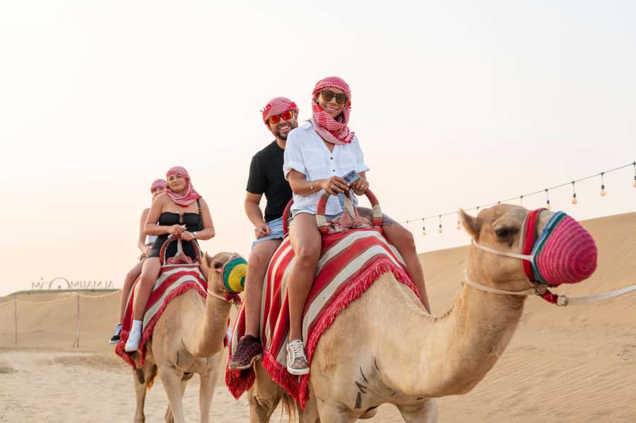 Dubai: Red Dune Desert Safari, Quad Bike, Camels, and BBQ - Hotel pickup and the ride into Dubai’s desert