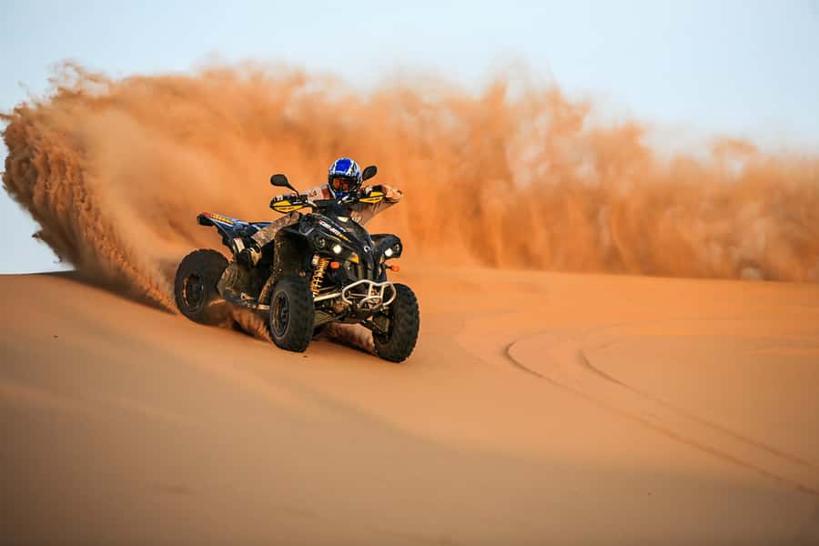Dubai: Red Dune Safari, Quad Bike, Camel Ride, BBQ Dinner - From Dubai hotels to the red sands of Lahbab