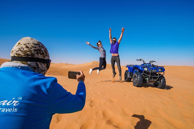Dubai Red Dunes ATV, Camels, Stargazing & 5<em> BBQ Al Khayma Camp – Key points to know before booking’ /></p>
<ul>
<li><strong>Red dunes and a full hour on an ATV:</strong> Ride through the open Lahbab desert after a safety briefing, with helmets and an instructor included.</li>
<li><strong>Al Khayma camp is the evening centerpiece:</strong> Expect Arabic coffee, dates, camel rides, henna, falcon photos, shisha, costumes, dinner, and entertainment.</li>
<li><strong>The $88 price covers a lot:</strong> Transport, fuel, equipment, activities, drinks, buffet dining, and shows are included.</li>
<li><strong>Evening departures offer the fullest program:</strong> Fire shows and stargazing are not part of the 11:30 AM departure.</li>
<li><strong>You need basic riding ability:</strong> Participants must be over 14, reasonably fit, and willing to sign an indemnity form.</li>
<li><strong>Guide service matters:</strong> Guides such as Dennis, Abdul Wahab, Asif Foji, Imran Khan, Omar, and Youness have been praised for being attentive and helpful with photos and safety.</li>
</ul>
<h2>From Dubai hotels to the red dunes of Lahbab</h2>
<p><img width="669" height="446" decoding="async" src=
