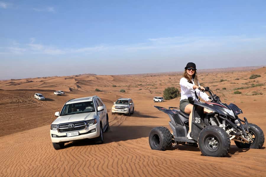 Dubai: Red Dunes Evening Quad Bike, Dune Blast with BBQ - Dune bashing and the sunset photo stop
