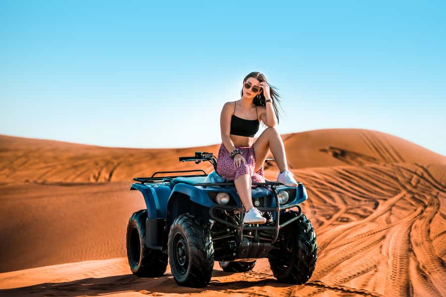 Dubai: Red Dunes Quad Bike, Dune Buggy, Camel & Refreshments - Sandboarding among the dunes