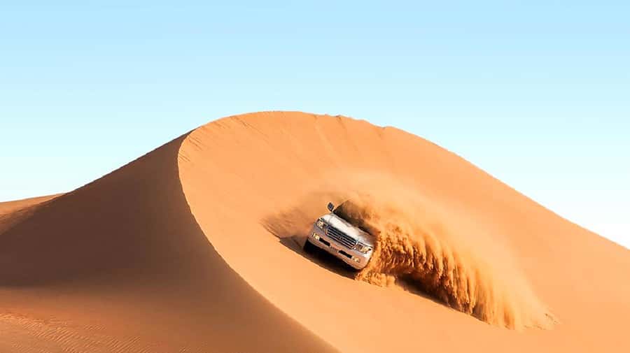Dubai: Safari, Quad Bike, Camel Ride, and Buffet Dinner - A 45-minute stop before the dunes