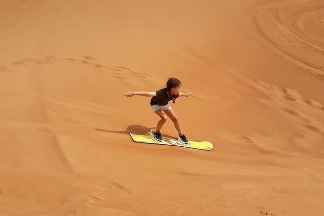 Dubai Self-drive Quad Bike, Sand Boarding, Camels & Refreshments - Guides, photos, and the human touch
