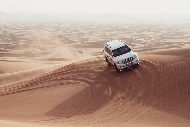 Dubia 4x4 Dune Bashing, Sandboarding, Camel Riding and Bbq Dinner - What This $29 Dubai Safari Actually Offers