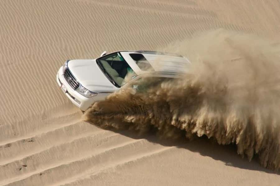 Dune Bashing, Sandboarding, Camel Ride & Optional ATV Ride - Transport, timing, and pickup choices
