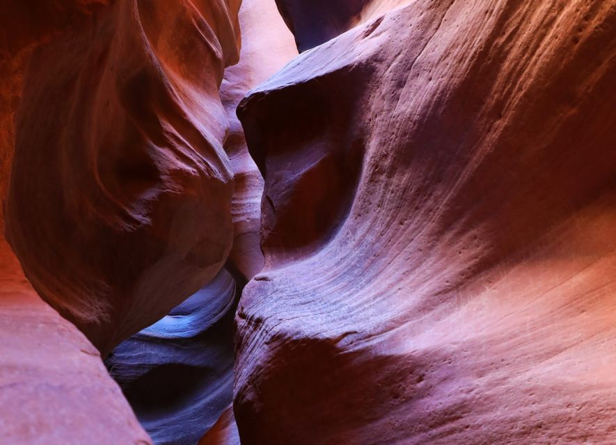 East Zion: Crimson Slot Canyon Exploration and UTV Tour - Entering a slot canyon with walls over 100 feet high