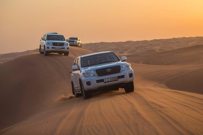 Evening Desert Adventure: Quad Biking, Sandboarding & Camel Ride - Dune bashing for 35 to 40 minutes