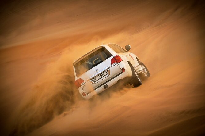 Evening Quad Bike, Desert Safari in Dubai , BBQ Dinner and Shows - Quad biking in the fenced desert area