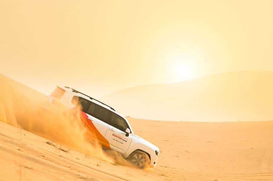 From Abu Dhabi: Dune Bashing Desert Safari - A short camel stop with a longer photo value