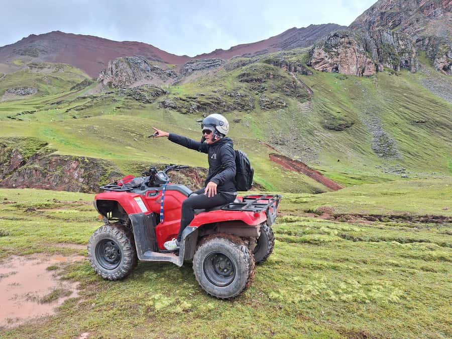From cusco: Rainbow Mountain ATV Tour with meals - A 20-minute ride through red hills and high-country scenery