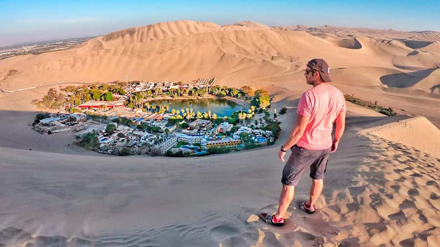 From Huacachina: Sandboarding and Dune Buggy Tour + Income - Practicing sandboarding on small dunes