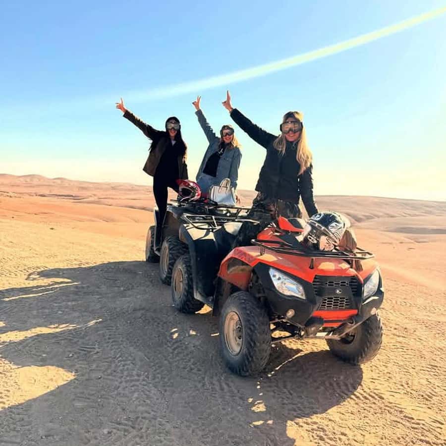 From Marrakech: Agafay Desert Dinner with Quad & Camel Ride - Sunset over a rocky desert