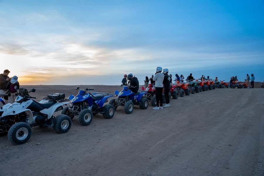 From Marrakech: Agafay Desert Quad Biking with Dinner & Show - Music, campfire, and the fire show