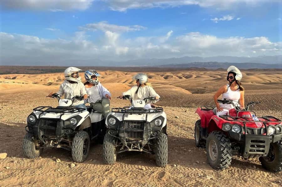 From Marrakech: Agafay Desert Sunset, Quad Biking, & Dinner - A Moroccan dinner under candlelight