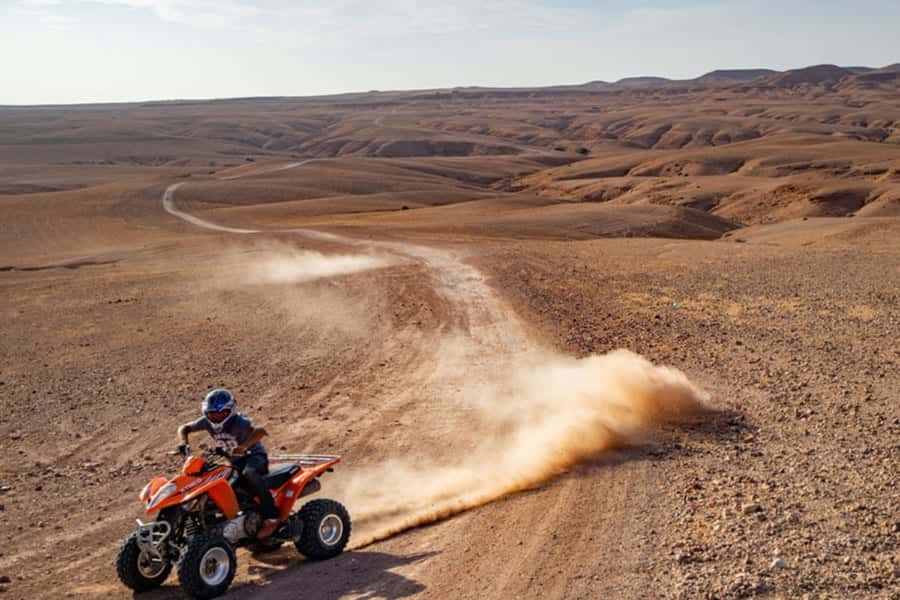 From Marrakech: Agafay Desert Sunset, Quad Biking, & Dinner - Ahwach music, dancing, and the fire show