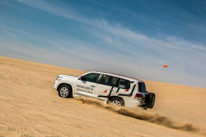 Full-day Qatar desert safari: dune bashing, sandboarding, camels - A long break at Al Majles Resort