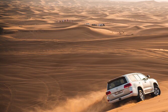 Full Day Safari Grand Adventures with Dune Bash on 4X4 in Dubai - Camel riding and sandboarding at the camp