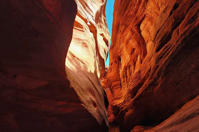 Great Chamber/Peekaboo Slot Canyon UTV Tour 4hrs - Walking through Peekaboo Slot Canyon
