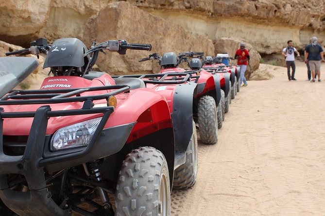 Hurghada: ATV Quad Safari& Bedouin Village Tour - Riding an ATV toward the mountains