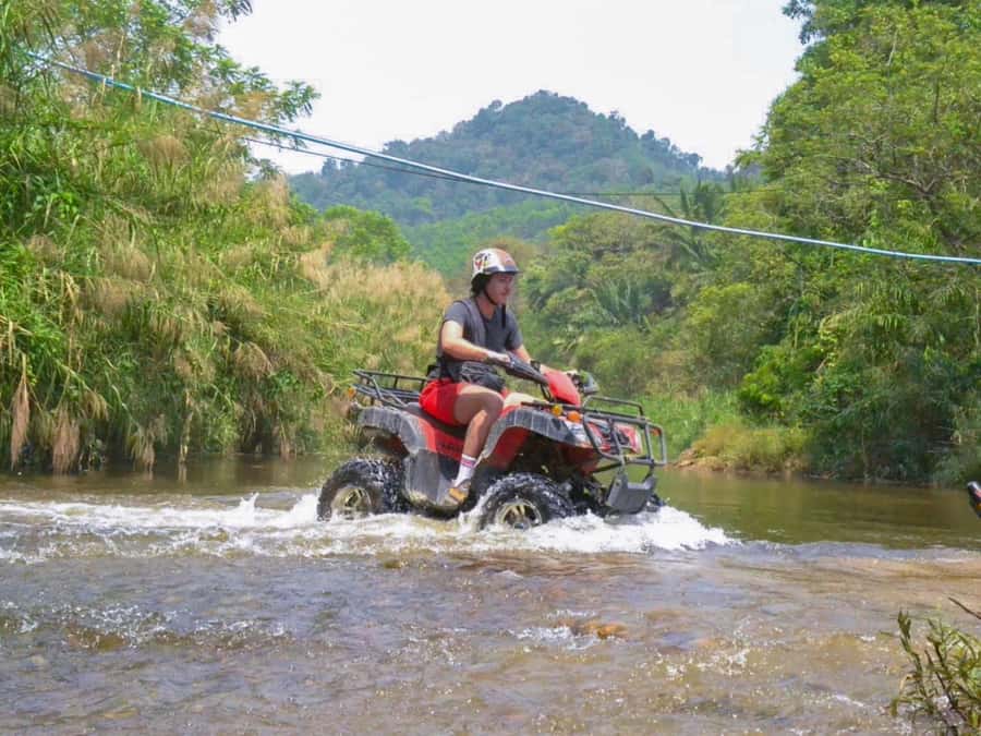 KhaoLak:ATV, ZipLine, & Rafting Adventure Monkey Cave Temple - A Thai lunch beside the river