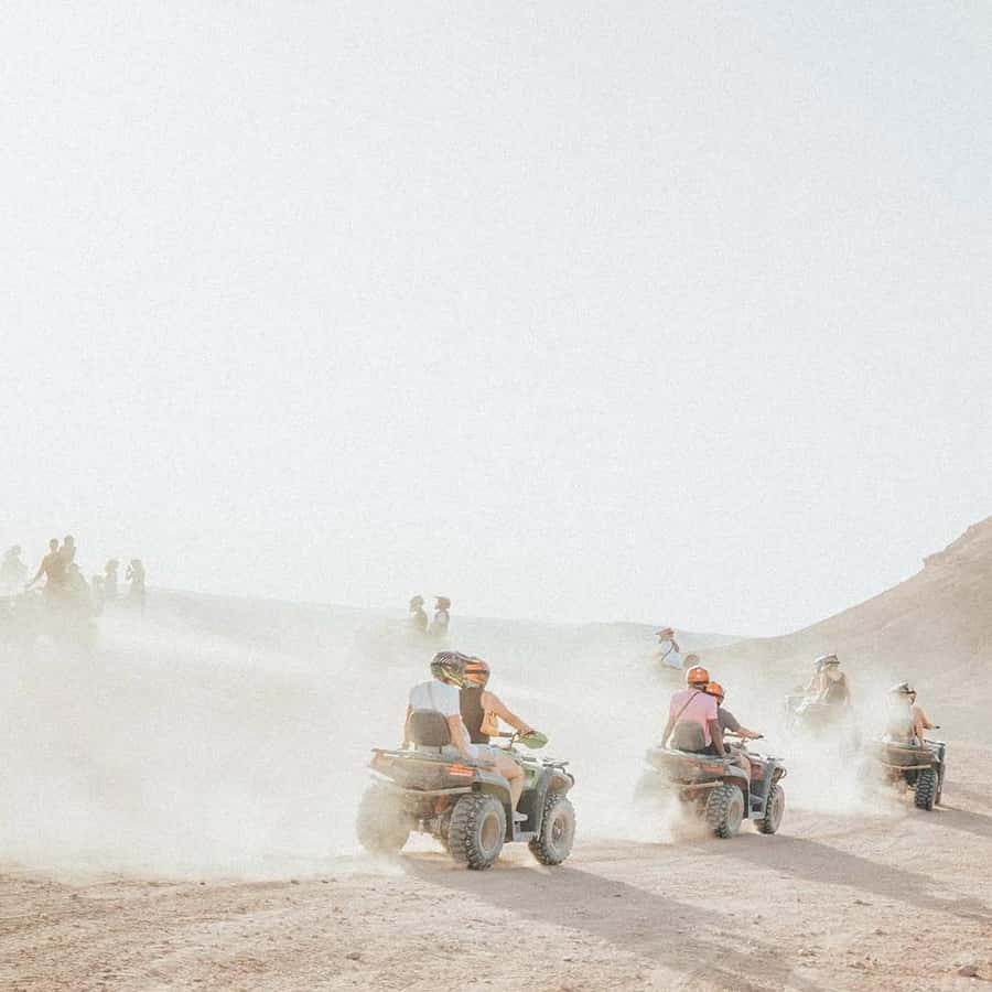 Marrakech: Agafay Desert Camel Ride & Quad with Dinner Show - Moroccan dinner under a traditional tent