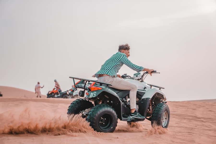 Marrakech: Agafay Desert Quad Bike with Camels & Dinner Show - Quad biking with two people per machine